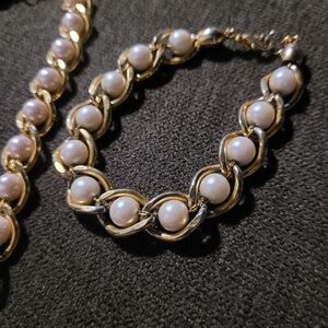 Vintage Faux pearl necklace, bracelet,& earrings set with gold encasing accent.